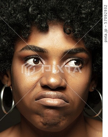 Close up portrait of young african-american emotional girl 57092932