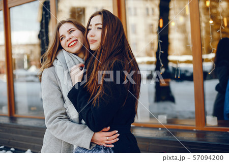 two pretty girl in a winter city two pretty girl in a winter city 57094200