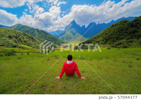 An Asian man watching at Fansipan mountain hills 57094377