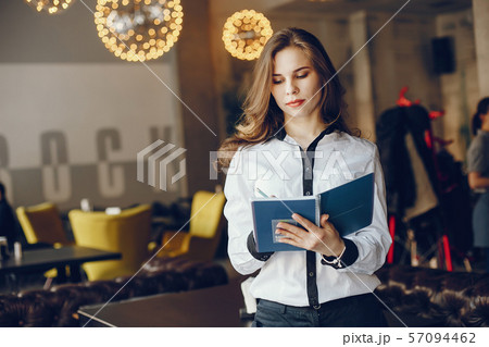 elegant business girl with notebook 57094462