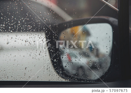 Drops Of Rain Drizzle on the glass windshield Drops Of Rain Drizzle on the glass windshield 57097675