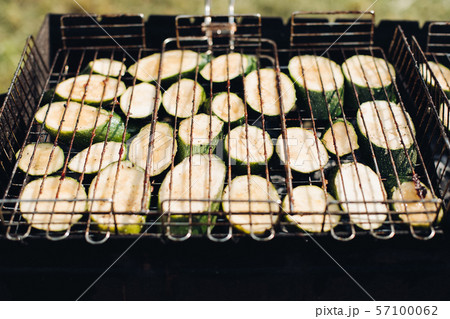 Cabbage on grill.Close-up of raw sliced squash Cabbage on grill.Close-up of raw sliced squash 57100062