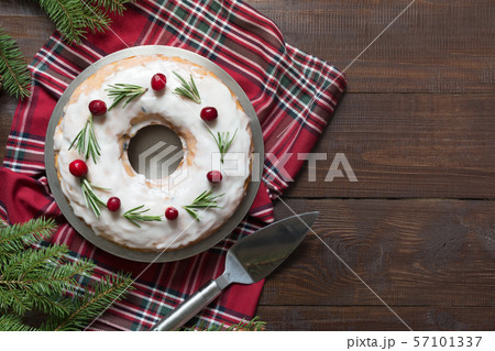 Traditional homemade Christmas cake with garnish 57101337