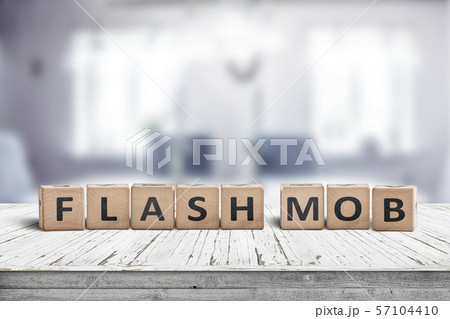 Flash mob message sign on a table in a bright room Flash mob message sign on a table in a bright room 57104410