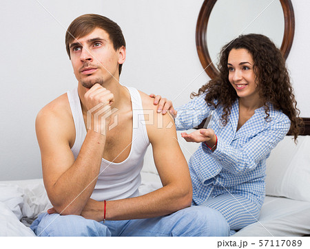 Wife wheedling forgiveness from husband after argue Wife wheedling forgiveness from husband after argue 57117089