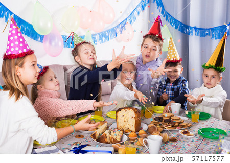 Children having birthday dinner Children having birthday dinner 57117577