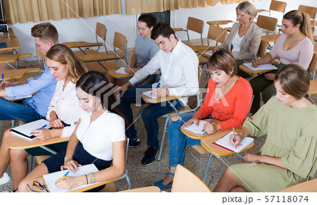 Group of people in lecture hall 57118074