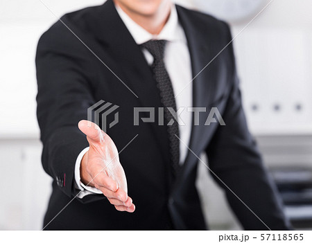 Businessmen ready to handshake Businessmen ready to handshake 57118565