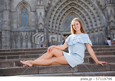 Girl sitting near temple 57119796