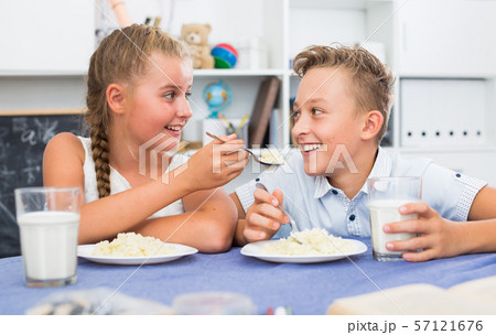Friends are feed each other during dinner 57121676