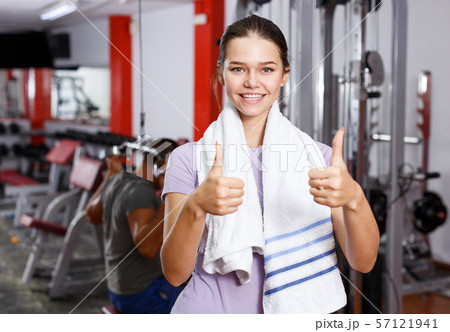 Woman posing at gym Woman posing at gym 57121941