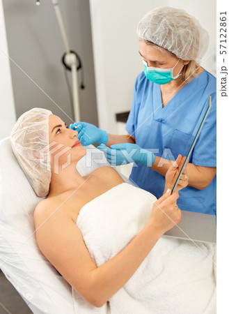 Woman getting ready for plastic surgery 57122861