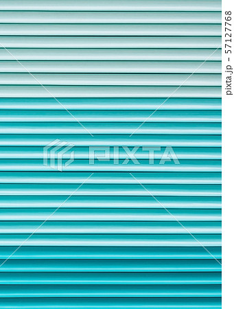 Lined striped plastic background in blue colors. Lined striped plastic background in blue colors. 57127768
