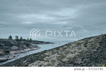 Rocky sea shore on an overcast day. Scenic view 57133792