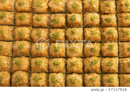 Top view texture of traditional turkish dessert baklava in the shop window showcase. Popular 57137918