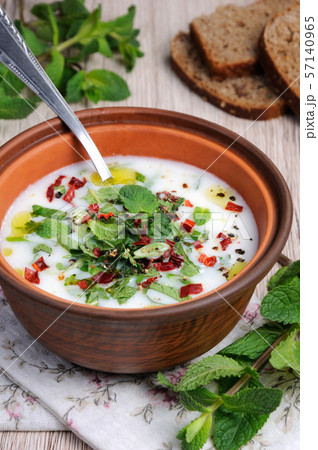Refreshing summer soup, the rice, mint and yoghurt, spices. Refreshing summer soup, the rice, mint and yoghurt, spices. 57140965
