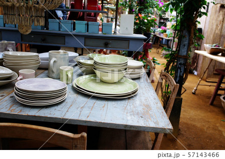 vintage dinning room and table with crockery. 57143466