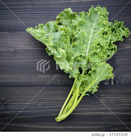 Fresh organic curly kale leaves flat lay on a 57147220