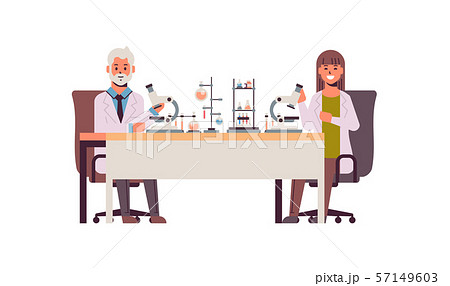 scientists couple using microscope man woman in uniform sitting at table making scientific 57149603