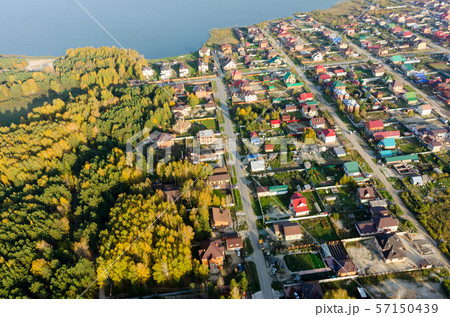 Aerial view onto rural street in autumn. Russia 57150439