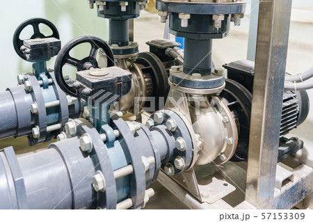 Water pump station and pipeline on roof deck of water tank 57153309