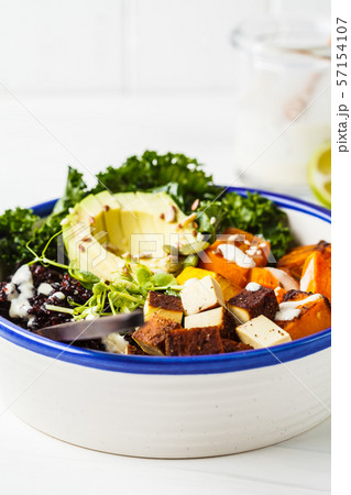 Buddha bowl salad with black rice, avocado, tofu 57154107