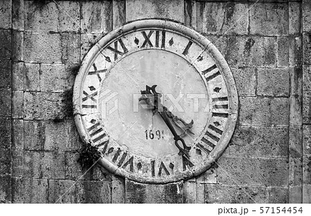 Ancient clock tower on Bell Tower in Perast 57154454
