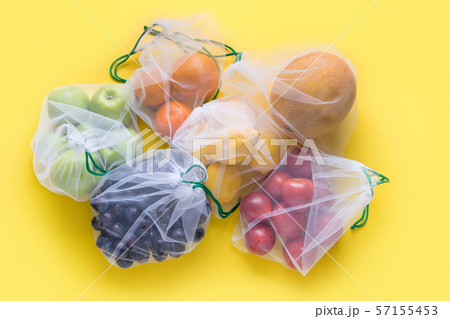 Fruits and vegetables in reusable net bag Fruits and vegetables in reusable net bag 57155453