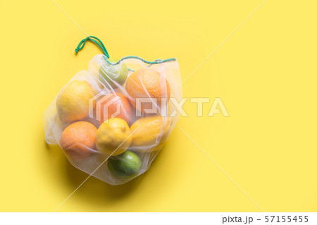 Fruits in reusable eco-friendly mesh bag. 57155455