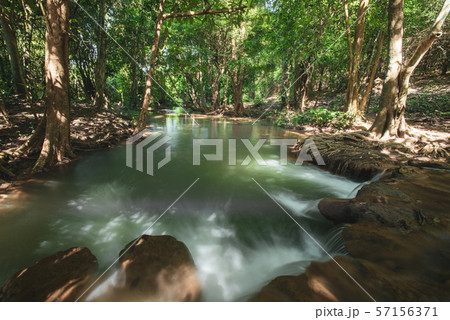 Waterfall green forest river stream landscape ,Waterfall hidden in the tropical jungle at National Park,Thailand. Waterfall green forest river stream landscape ,Waterfall hidden in the tropical jungle at National Park,Thailand. 57156371