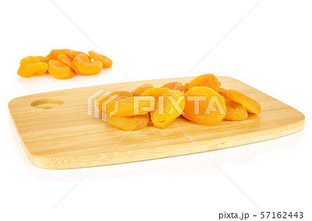 Dried orange apricot isolated on white Dried orange apricot isolated on white 57162443