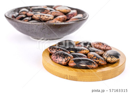 Stained purple bean isolated on white 57163315