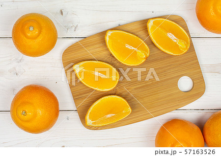 Orange minneola tangelo on grey wood 57163526