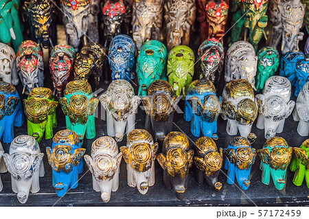 Typical souvenir shop selling souvenirs and handicrafts of Bali at the famous Ubud Market, Indonesia 57172459