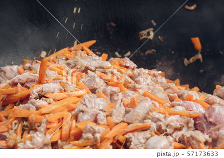 Process of cooking of delicious pilaf. Concept of Process of cooking of delicious pilaf. Concept of 57173633