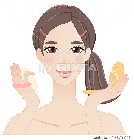 ファンデーションでメイクアップする女性	 57175771