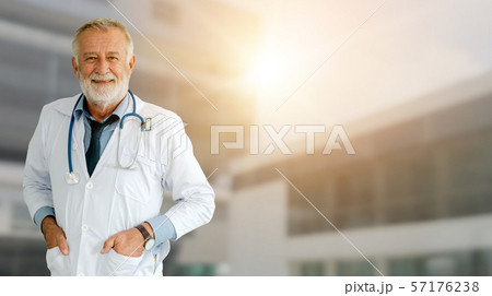 Senior male doctor working at the hospital. 57176238