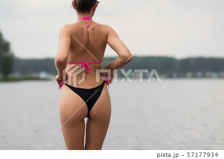 Fit Hot Woman Taking Off Swimsuit Panties Stock Photo - Image of