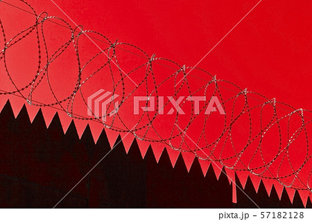 Original barbed and smoke industrial background on blue sky. 57182128