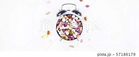 Alarm clock with color pills Alarm clock with color pills 57186179