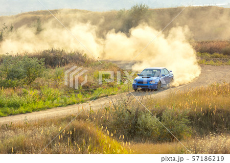 Sports Car on a Bend and a lot of Dust 02 57186219