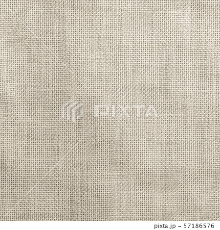 Hessian sackcloth woven texture pattern background in light sepia tan brown color tone 57186576