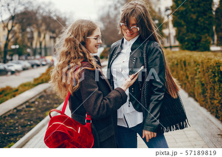 two stylish girl in a city two stylish girl in a city 57189819