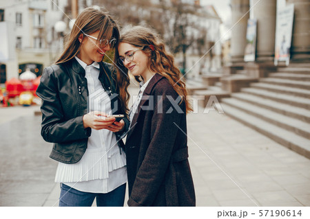 two stylish girl in a city two stylish girl in a city 57190614