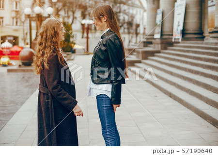 two stylish girl in a city two stylish girl in a city 57190640