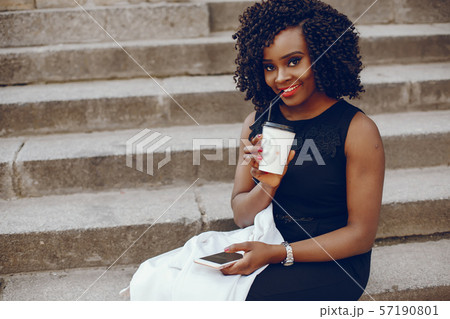 stylish black girl in a city 57190801