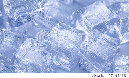 Cubes of ice covered with water drops. Frozen 57194418