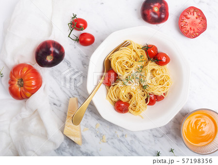Italian pasta spaghetti with fried cherry tomato Italian pasta spaghetti with fried cherry tomato 57198356