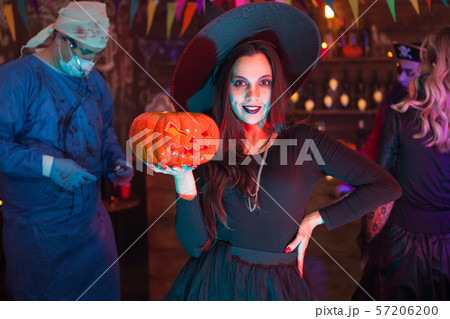 Friends celebrating halloween looking like scary monsters Friends celebrating halloween looking like scary monsters 57206200