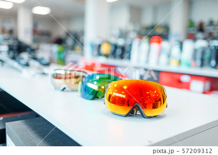 Ski and snowboarding mask, showcase in sports shop Ski and snowboarding mask, showcase in sports shop 57209312